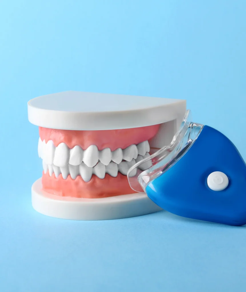 Clear dental aligner or occlusal appliance resting against a jaw model fabricated using digital dental impressions