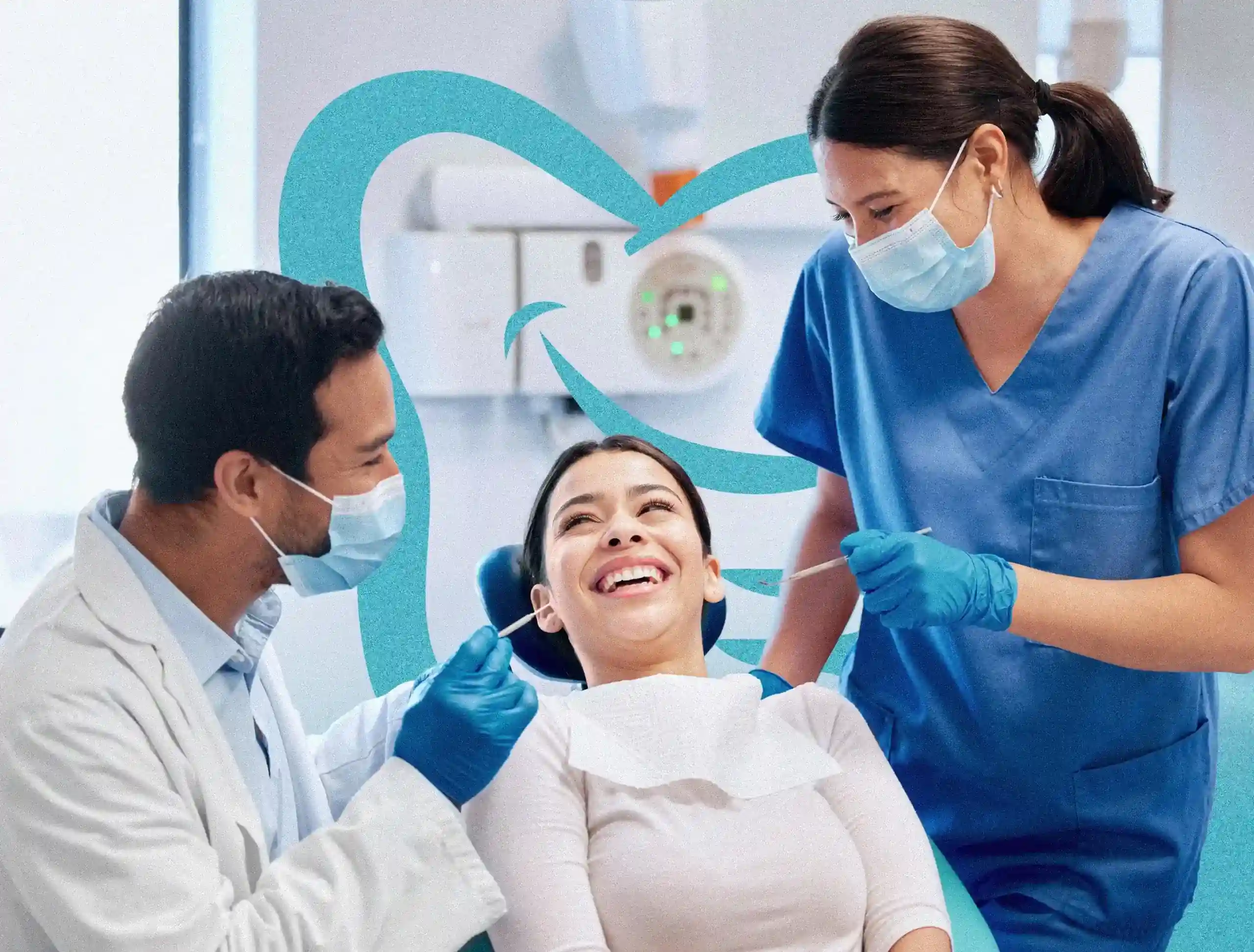 Dentist and assistant in masks attending to a smiling female patient in chair